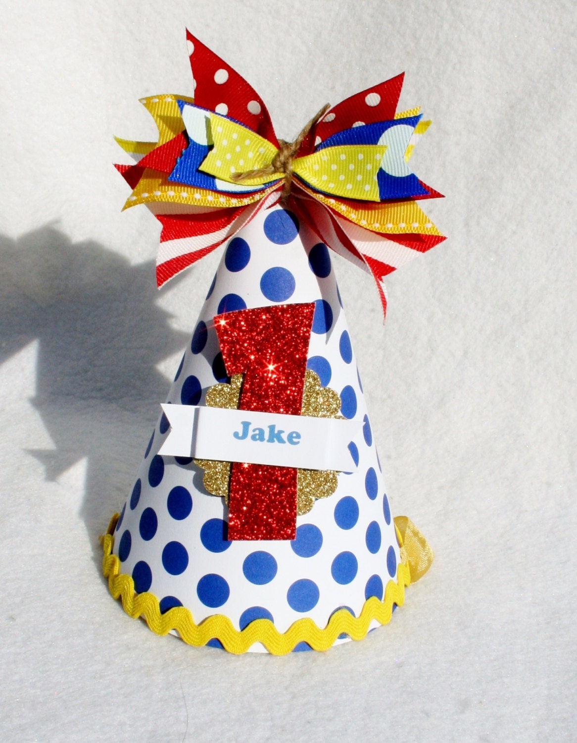 Jake and the Neverland Pirates party hat in red, blue, yellow and gold