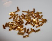 Long Gold Glass Beads - .1oz