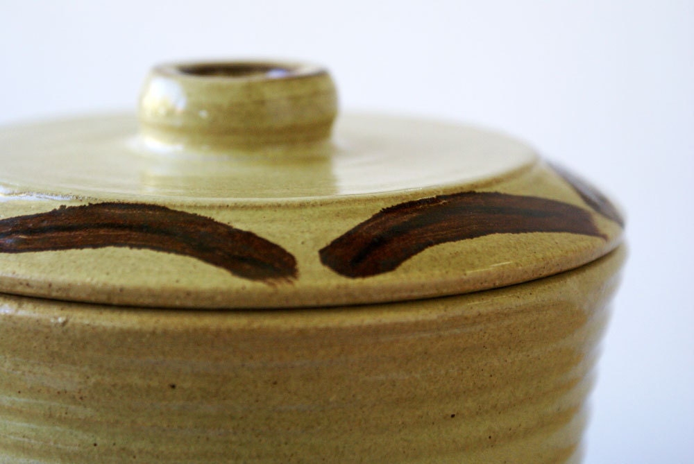 Tall ornate ceramic kitchen canister - stoneware pottery jar in pepper yellow