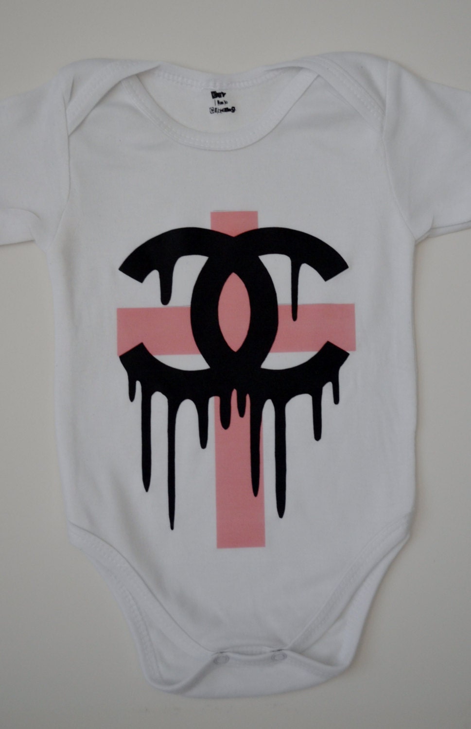 Pinkl Dripping CC Cross onesie