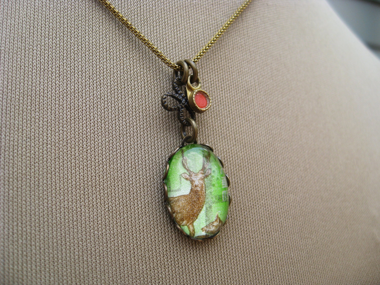 deer - postage stamp necklace.