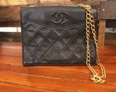 Vintage Chanel quilted black leather bag
