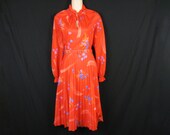 1970's red floral dress. ruffle keyhole, pleated skirt. medium.