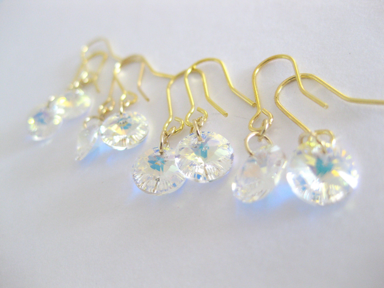 Set of 4 white swarovski crystal disc earrings. Petite and dainty wedding or bridal jewelry.