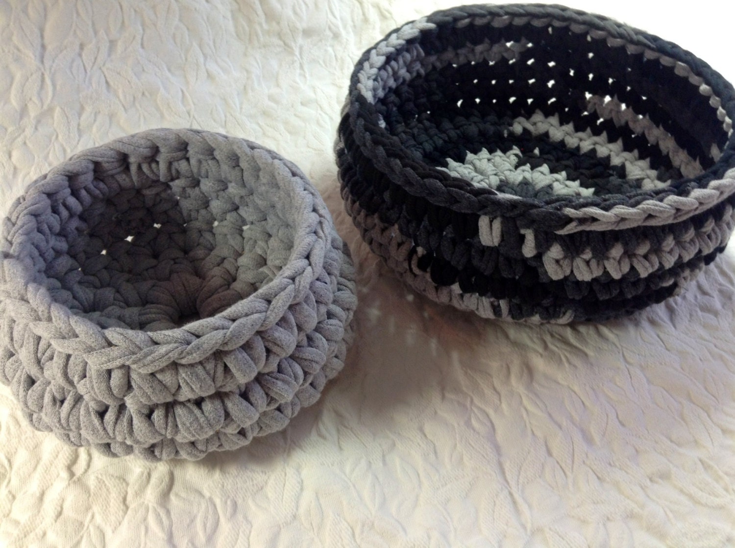 Black and gray cotton crocheted baskets created from recycled t shirts
