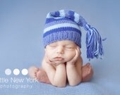 Newborn elf hat with long toggle.