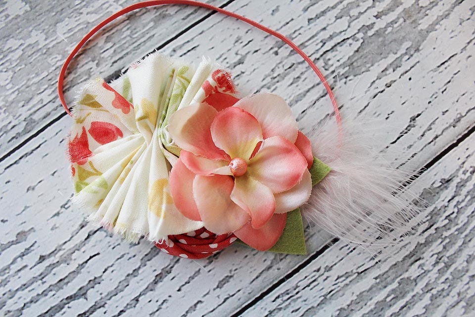 Prim and Posh- ruffle, rosette, silk flower and feather headband in coral peach green and ivory