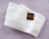 new knitted headband ear warmer with vintage embellishment The Best is Yet to Come saying