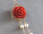 red rose with double strand white Swarovski pearls necklace. red and tiffany blue wedding. bridal party. vintage