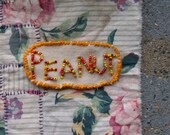 Beaded Peanut Badge