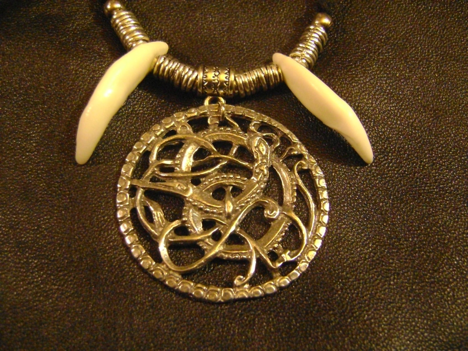the Norse Wolf Cometh- -viking wolf pendant with real wolfs teeth