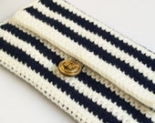 Navy and white striped cotton crochet clutch with golden anchor button