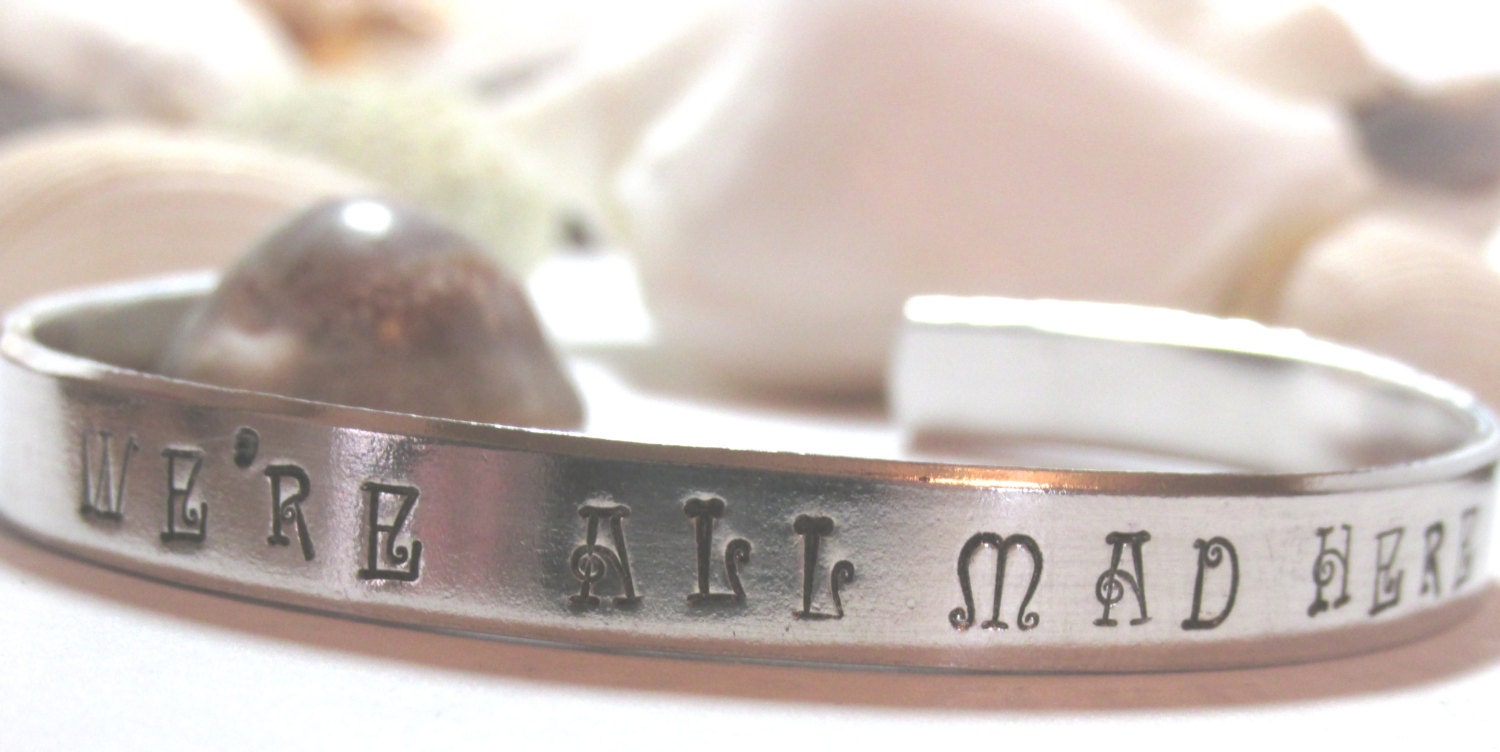 We're All Mad Here Hand Stamped Silver Toned Bracelet Inspired by Alice in Wonderland Stock Number 515A