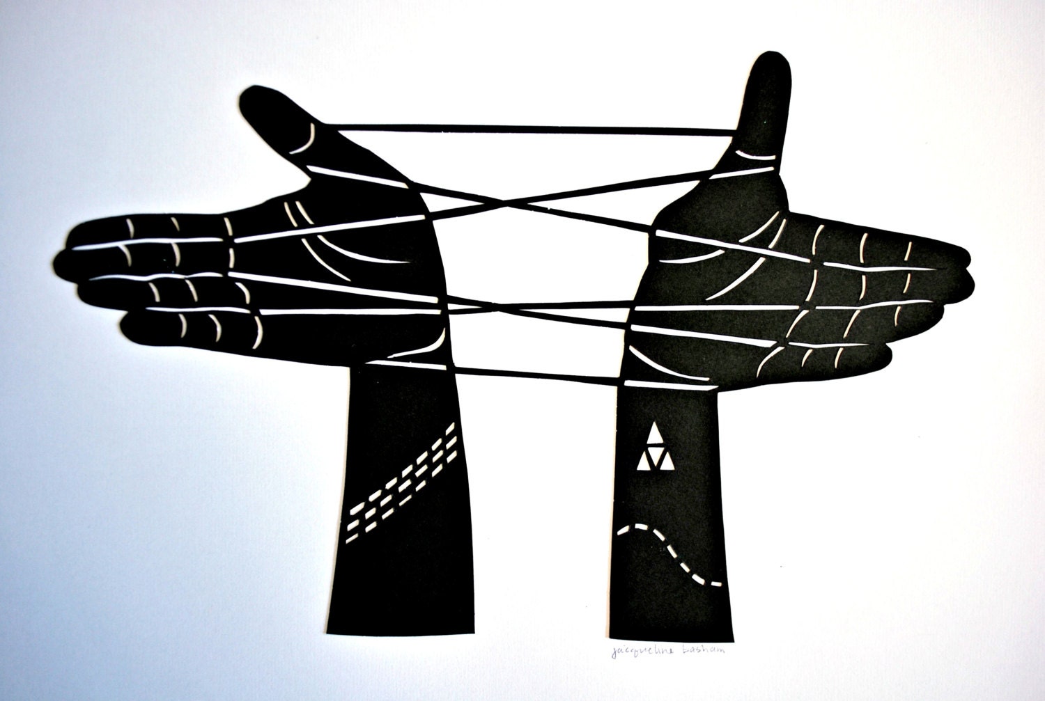 Paper cut illustration of "Cat's Cradle" game