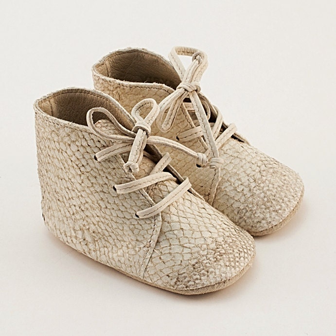 Baby shoes from beige fish leather