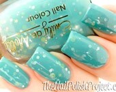 Nail polish - "A certain shade of green"  silver, green and purple glitter in a green base