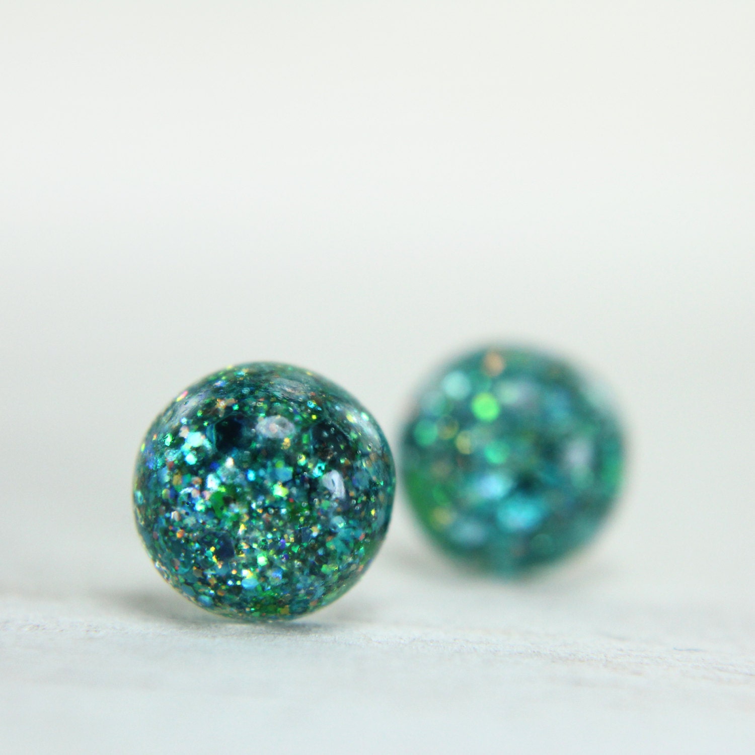 globe earrings in mermaid green sparkles - 8mm - galaxy sparkle stud earrings