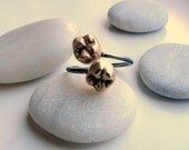 Human tooth ring.