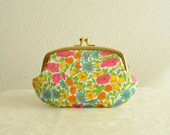 Liberty poppy floral clutch clasp purse for iPhone case and more.