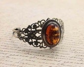 Vintage earring cuff bracelet . Recycled jewelry.  A piece of amber.  One of a kind. Free international shipping