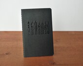 black moleskine journal: calligraphy quills pens