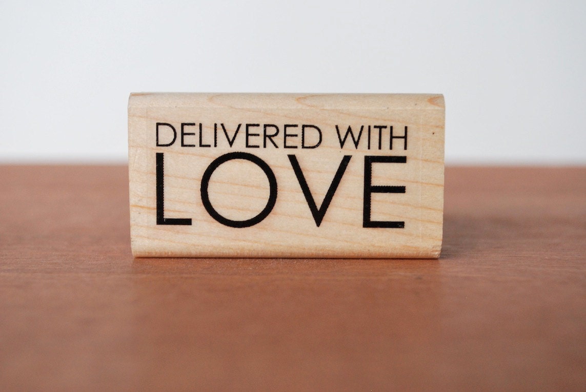 rubber stamp: delivered with love, mail stamp