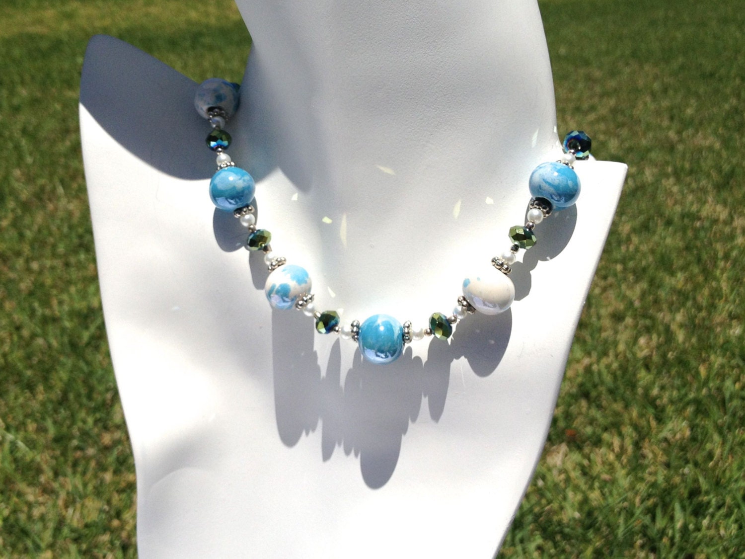 SKY BLUE: (White and Blue Speckled Ceramic Beads with Teal Swarovski Crystals in a Single Strand Necklace with Small Glass Pearls)