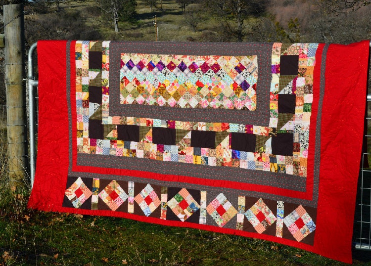 Queen size patchwork collection quilt, hand quilted.