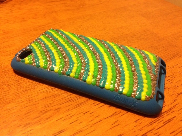 iPod touch case. 3D glittery blue yellow and green