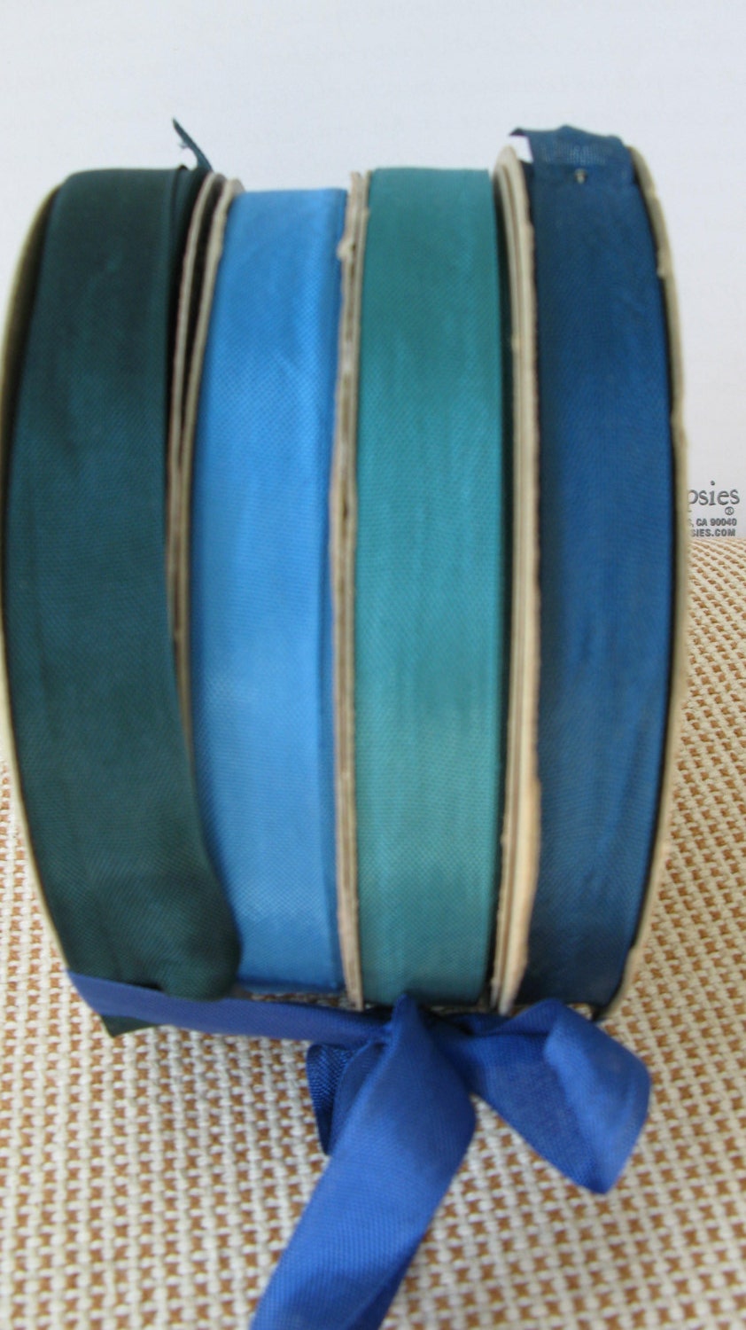 Seam Binding by Hug Snug  4 100 yard rolls  Blue and greens