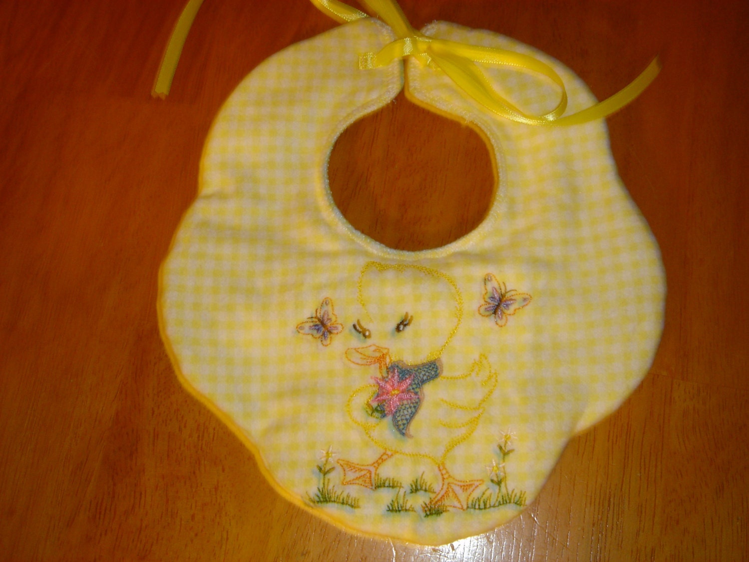 Triple Layered Decorative Yellow Gingham Flannel Bib embroidered with vintage Ducky design w/ ribbon tie closure