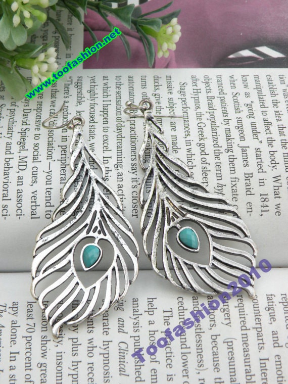 Pretty retro silver blue bead peacock feather shape earrings vintage style