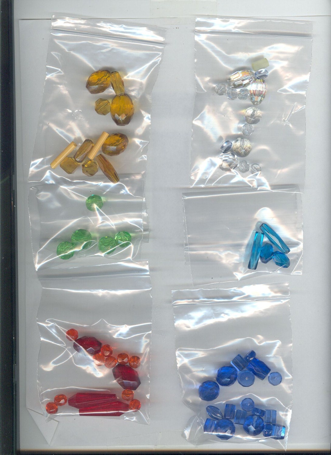 Six Pretty Packages of 1920s Czechoslovakian Glass Beads in Bags