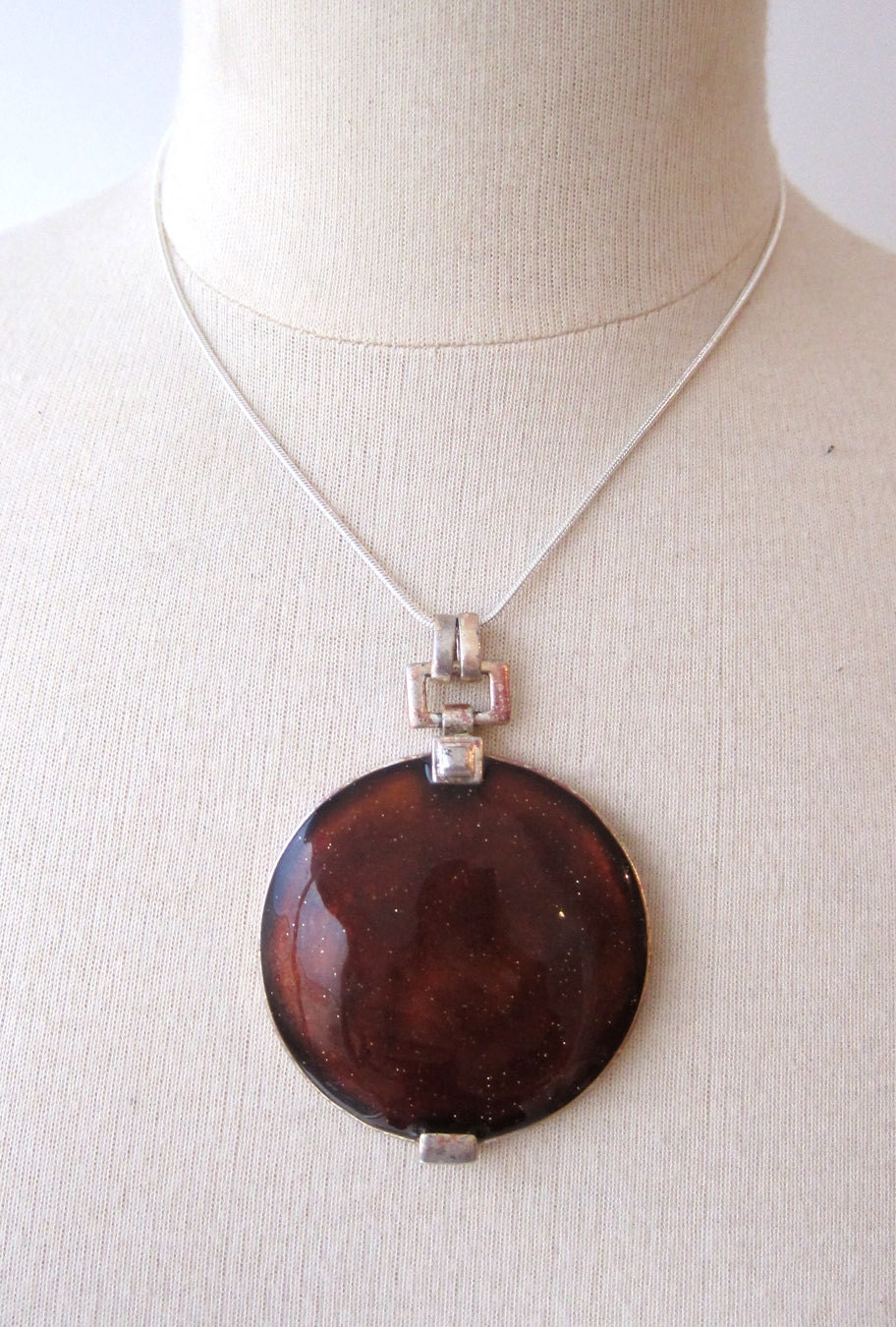 Vintage 1980s big round silver plated brown sparkly enamel pendant
