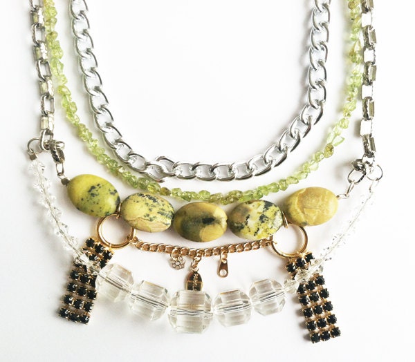 Multilayered necklace with yellow turquoise, peridot, and chains