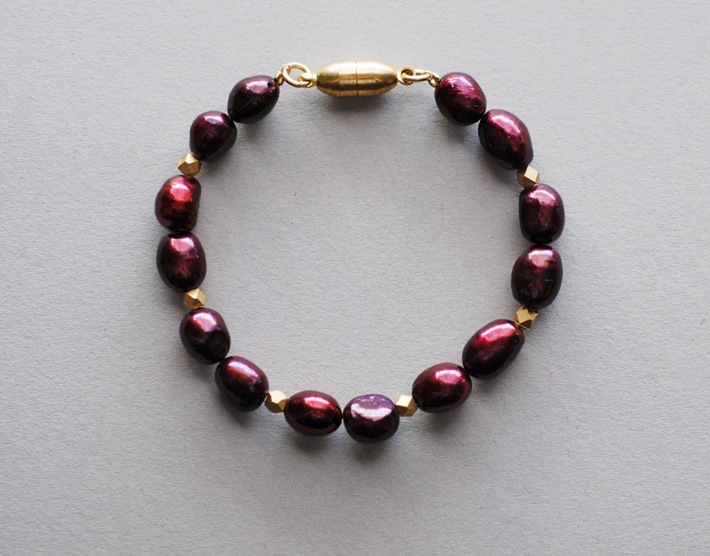 no. 152 - dark magenta pearl and golden brass bracelet