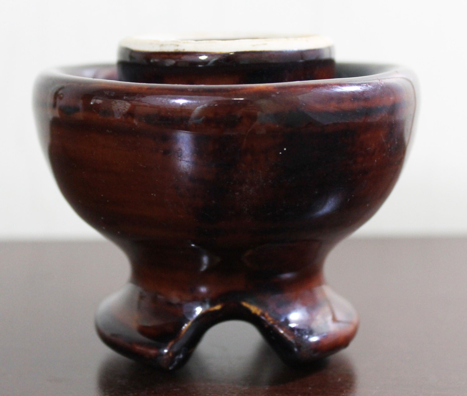Brown Ceramic Insulator from Electric Pole by