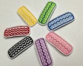 Chevron felt snap clips in your choice of colors. Red yellow green blue pink purple or black