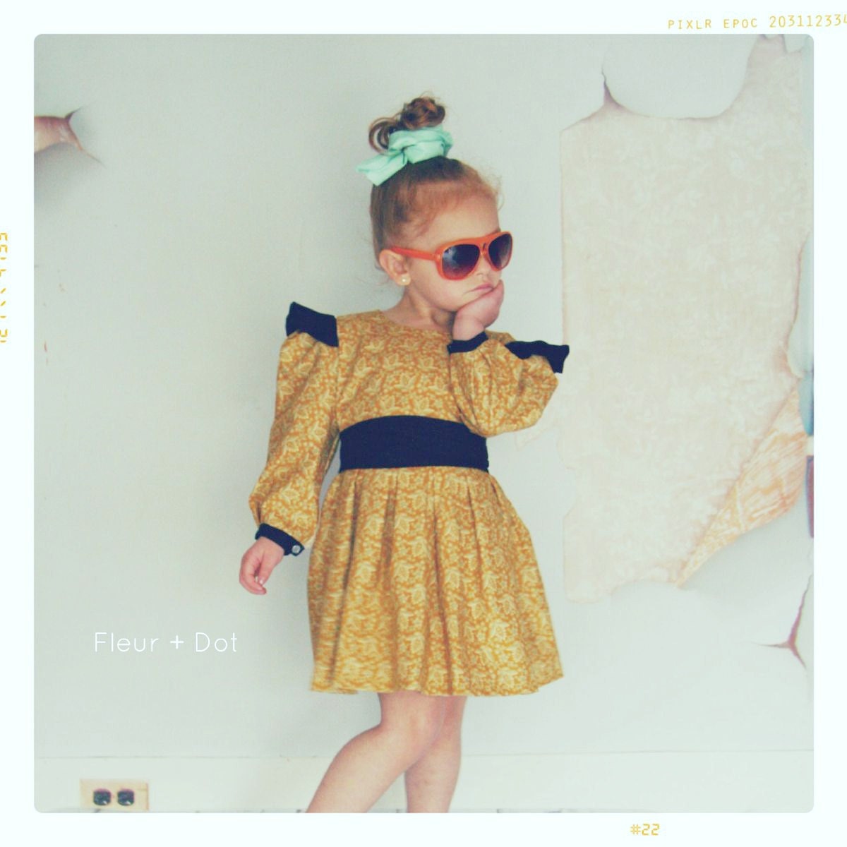 Girls Dress: Open Prairie Dress in Golden Print with Black Detailing from the Fleur and Dot Autumn Winter Collection