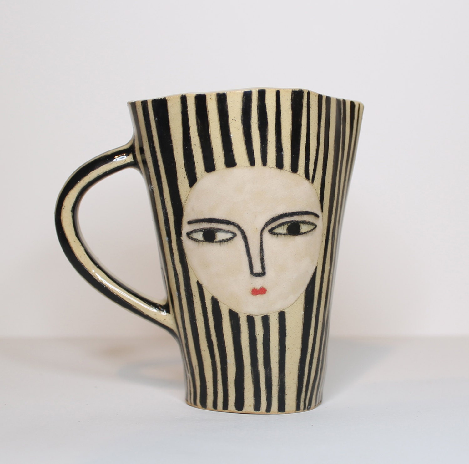 Striped Creamer Jug with face