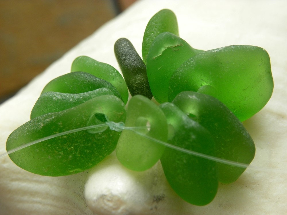 Genuine green sea glass, drilled for charms, beads, pendants 11 pieces