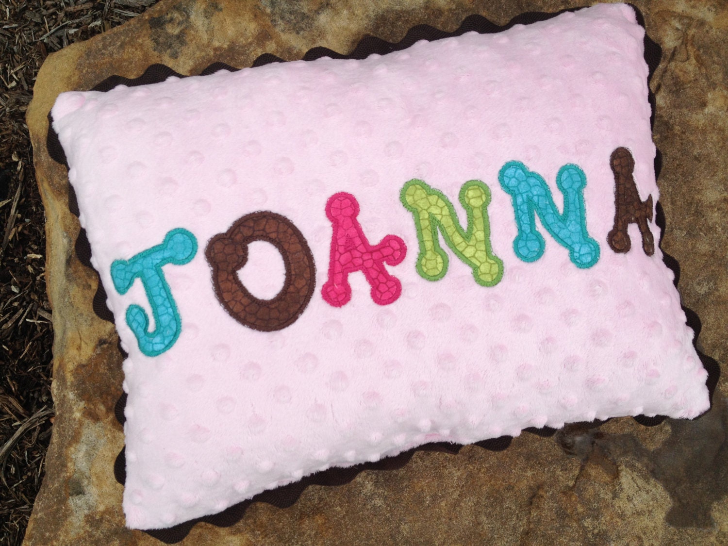 Personalized pillow for baby girl with name appliqué and minky material
