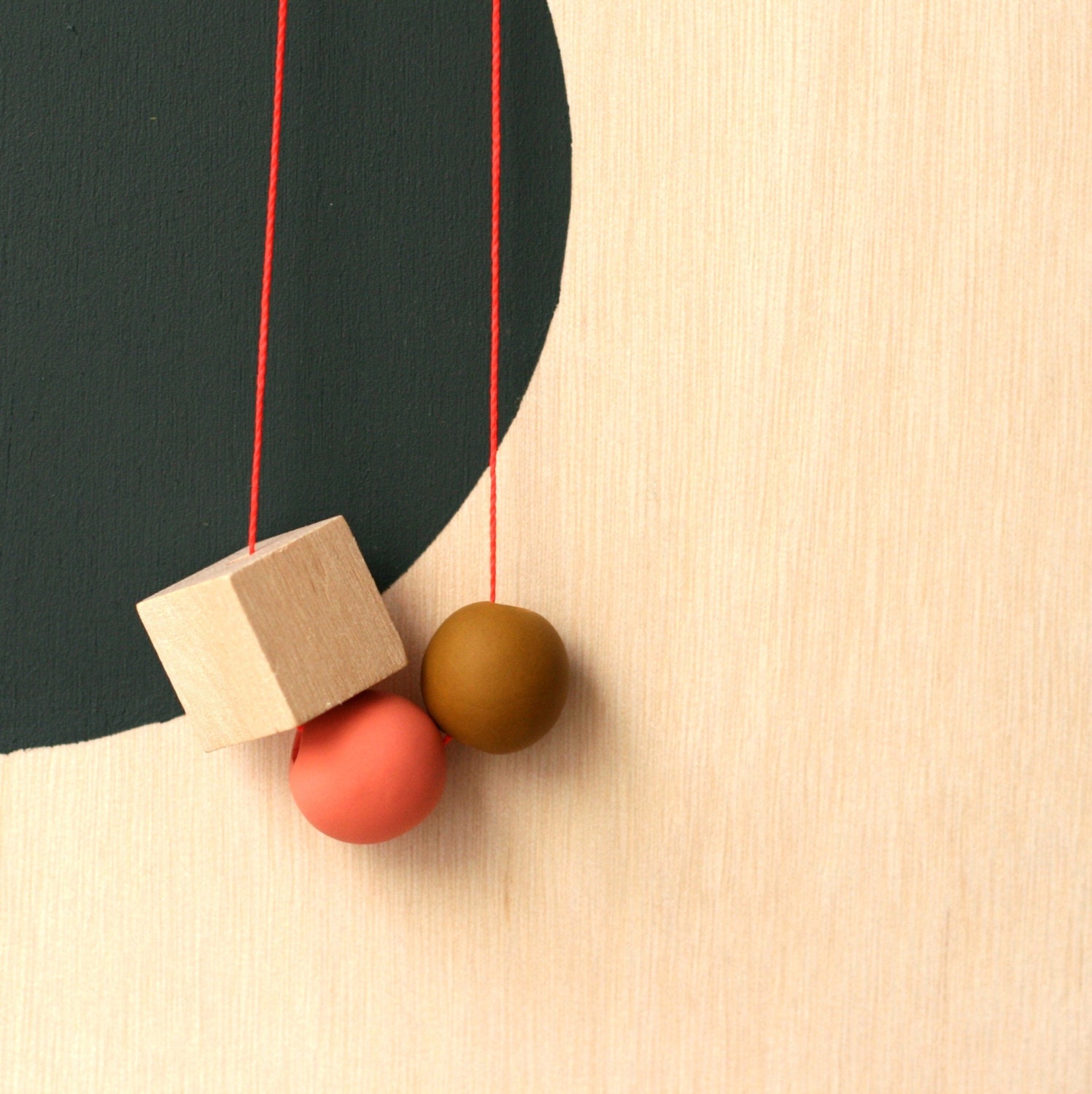 and a cube makes a necklace