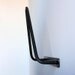 Hairpin magazine rack