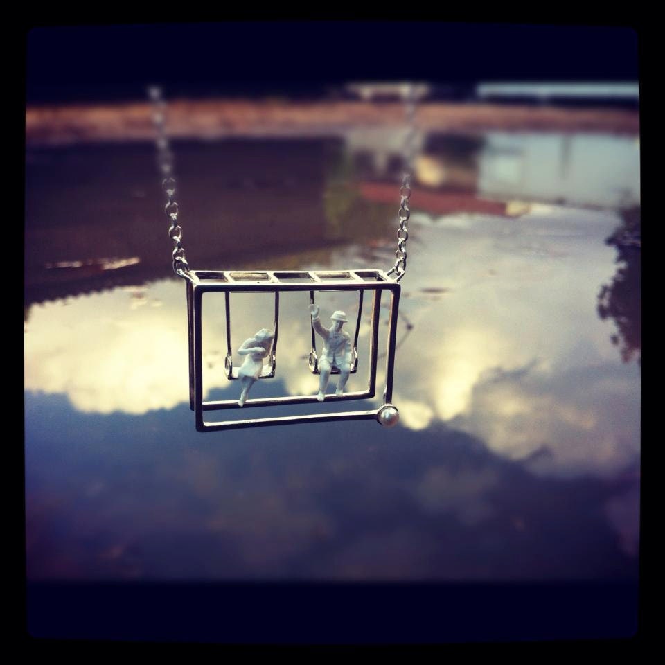 Silver necklace with  lovely  free moving dangling swings -"T(w)o swings"
