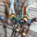 Gorgeous teal blue orange and brown braided leather feather headband belt lariat