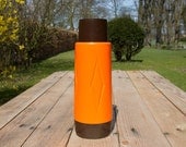 Orange and brown thermos flask