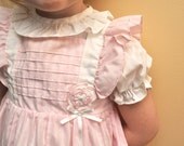 4T pink and white pinafore apron dress, with stripes, collar, flower, bow, ruffles and tie