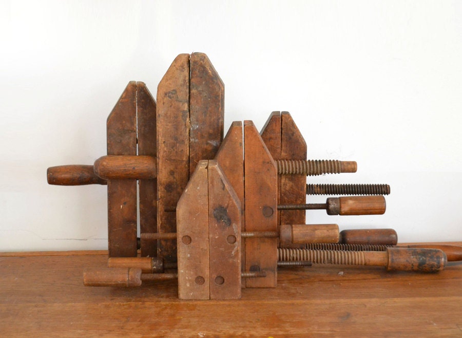 instant collection of 5 primitive vintage and antique wooden clamps  offered by Elizabeth Rosen