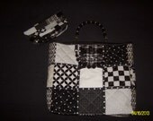 Black & White  Quilted Tote  with Black and  Silver Beaded  Handles, ribbon, and  snap closure with BONUS coupon clutch organizer